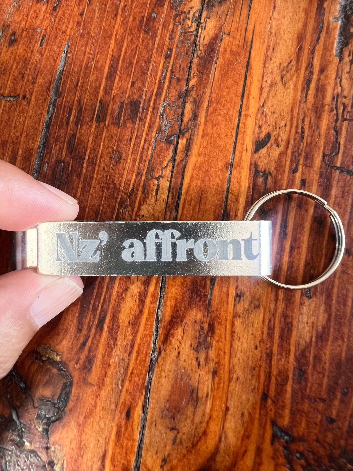 Portachiavi/Apribottiglia inciso “Nz’ affront’”