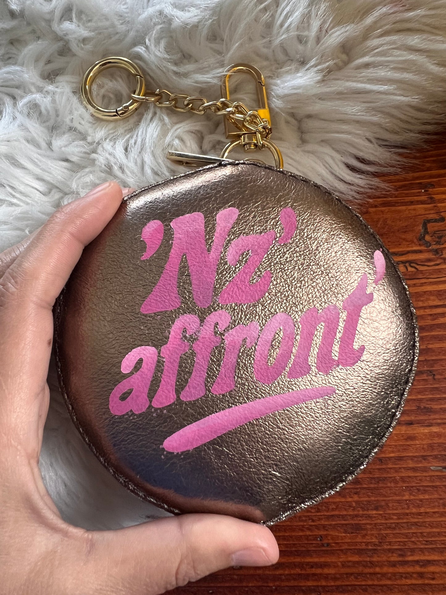 Charm/portamonete in pelle “‘Nz’ affront’”